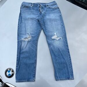 Levi's 501 customized, ripped and tapered blue jeans